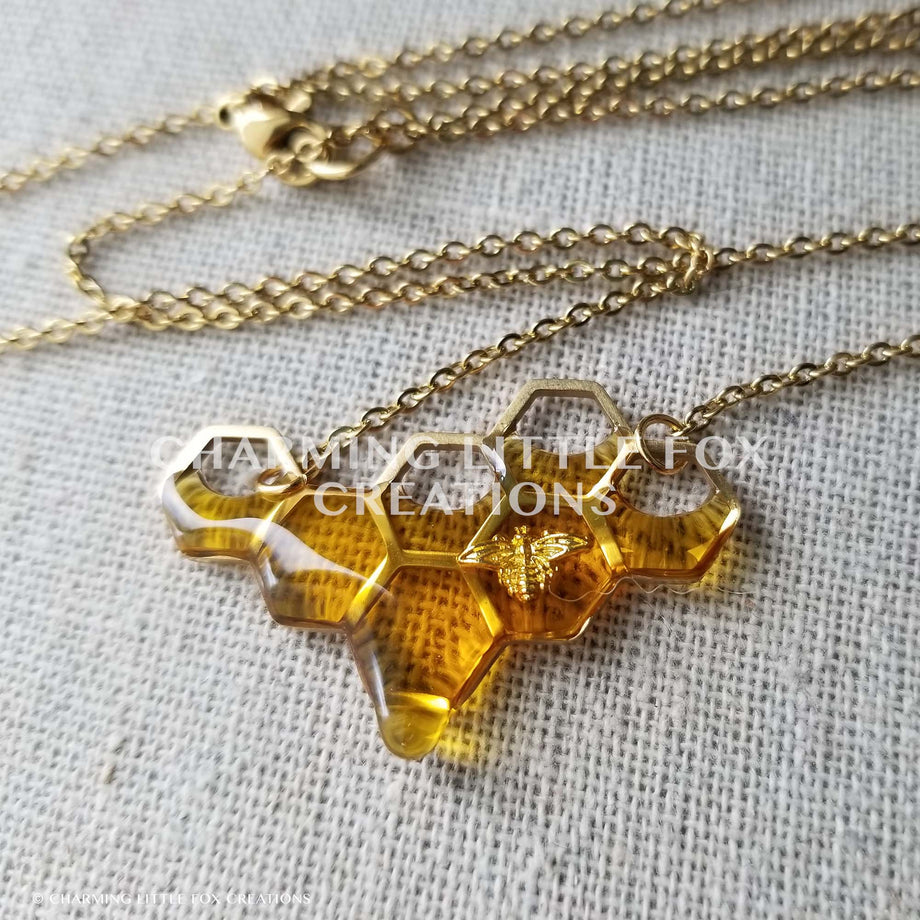 One of my favorite necklaces. Honey comb pendant with Honey colored resin.  : r/crafts